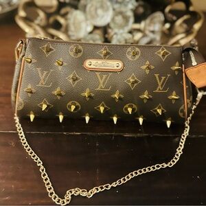 Iconic Monogram Eva bag with Gold Spikes